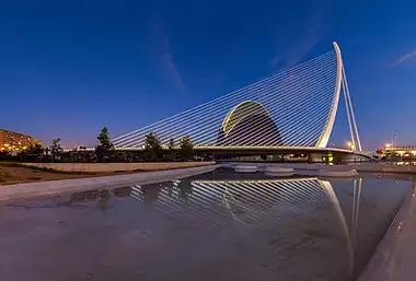 Image 1Assut de l'Or BridgePhotograph: Diego DelsoThe Assut de l'Or Bridge is a white single-pylon cable-stayed bridge in the City of Arts and Sciences, Valencia, Spain. Completed in 2008, it was designed by Valencian architect and civil engineer Santiago Calatrava as a variant of his cantilever spar cable-stayed bridge in Seville.More selected pictures