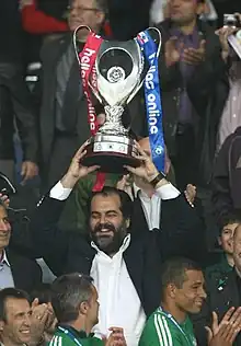 The president of PAO, Nikolas D. Pateras, with the Greek Football Cup (2010).