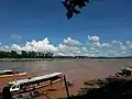 Mekong River tour boats, with Laos in the background