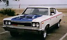 In white with red, white, and blue stripes