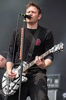 Lewis performing in 2015