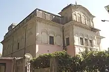 A side view of part of Palace of Arki/Bhagal Palace