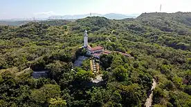 Aerial shot of Cape Bojeador Lighthouse and surrounding landscape