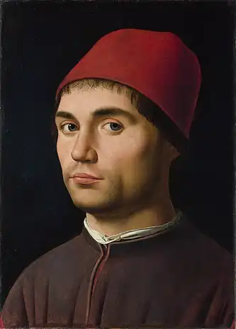 Portrait of a Man with a Red Hat, c. 1475–1476, Antonello. National Gallery, London. Like Antonello, Leonardo emphasizes the subject's face, which dominates the frame.