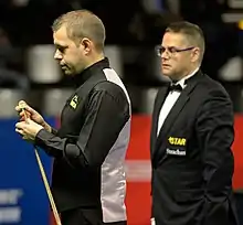 Photo of Hawkins, with a referee