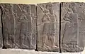 Basalt wall slab showing Assyrian soldiers in procession, holding maces and bows. From the palace of Tiglath-pileser III at Hadatu, Syria. Ancient Orient Museum, Istanbul