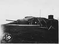 Battery 245, two 6-inch guns on shielded barbette carriages, built in World War II. The battery's ammunition and fire control bunker is behind the gun.