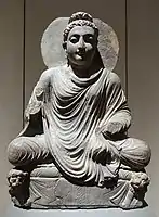 The Buddha on lion throne. Takht-i-Bahi. Schist, H. 525 mm (20.7 in). Museum für Indische Kunst.