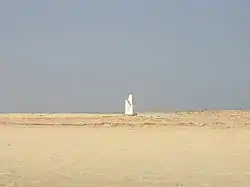 The lighthouse and the headland facing about southwest and the point
