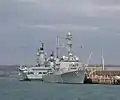 USS Mitscher at Portsmouth in October 2008 berthed with HMS&nbsp;Ark Royal and HMS&nbsp;Illustrious.