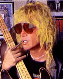 Danny Sheridan with his 1951 Fender
Precision Bass in a photograph that appeared in Bass Player Magazine, October 2001. (Photo by Carol Sheridan.  Used with permission)