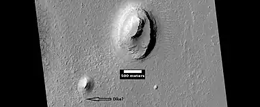 Buttes, as seen by HiRISE under HiWish program. Buttes have layered rocks with a hard resistant cap rock on the top which protects the underlying rocks from erosion.