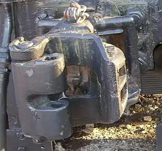 MCB Type 5 coupler circa 1893. Split knuckle accommodates link and pin coupler or Johnston coupler. Vertical hole in knuckle accommodates the pin. Could also have accommodated a buffers and chain coupler with an extra pin.