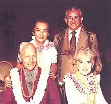 This a picture of Hawaii Governor John Burns with his wife Beatrice with Hazel and Ernest Murai.