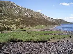 Far eastern end of Uidh Fhearna looking eastback down the side of Loch Veyatie The 'shore' of the loch here was fairly flat before narrowing down towards Uidh Fhearna