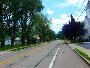 NY 249 east through the center of Farnham