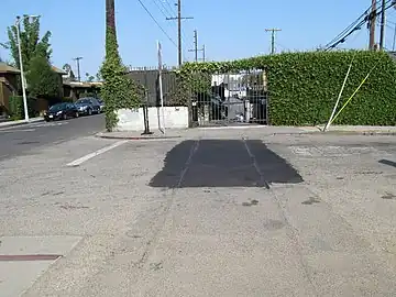 Former tracks of the Inglewood Line on Venice's Broadway Street, next to Electric Avenue