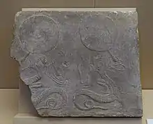 Fuxi and Nuwa holding the sun disc and moon disc respectively, Eastern Han dynasty, 25-220  AD.