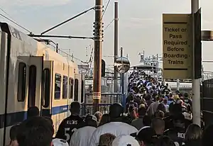 Crowd Baltimore Ravens fans at Hamburg Street station in Stadium Area, Baltimore