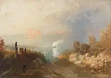 A few small figures are scattered along a track lined with tumbled masonry and trees, which leads steeply downwards towards a distant shore. A boat in the surf is making white smoke, while a larger cloud of black smoke issues from another boat further out. Across the water are high pink cliffs.