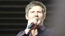 Orange performing with Take That in 2011
