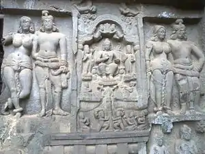Entrance, right panel with Mithuna couples, and central Mahayana-period panel.