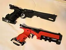 Homologated laser pistols