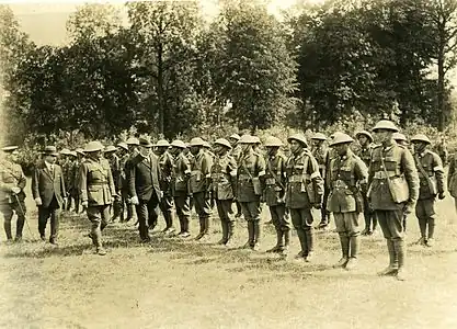 H684. William Massey and Sir Joseph Ward inspect the Pioneer Battalion at Bois-de-Warnimont, France, 30 June 1918. Photo: Henry Armytage Sanders