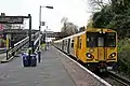 A Merseyrail Class 508 arrives with a service from Liverpool.
