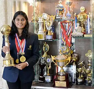 P. V. Nandhidhaa with her prized Chess trophies at her residence in 2020
