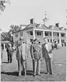 Dutra (in uniform), outside the George Washington home at Mount Vernon, during his visit to the United States.