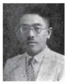 a black and white portrait of a 1920s Chinese man with a moustache