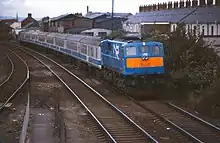A 111 Class hauling a rake of Mark 2 carriages at Adelaide in 1988.