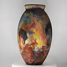Copper Matte Raku fired oval made by Adil Ghani from RAAQUU, Malaysia