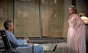 Still image from the film Read Window featuring Stewart and Kelly