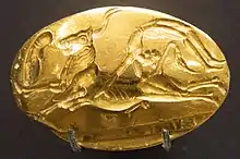 Bull-leaping on a gold signet ring