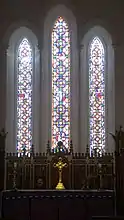 Stained glass window above the altar