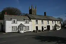 A roadside photograph of the two-storey building that houses the pub