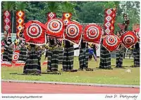 T'boli women utilizing the s'laong kinibang in dance