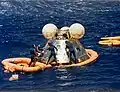 US Navy divers from USS New Orleans recovering the ASTP Apollo Command Module in July 1973.
