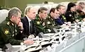 Vladimir Putin with the leadership of the Ministry of Defense and General Staff along with other Russian generals at a meeting in the National Defense Management Center